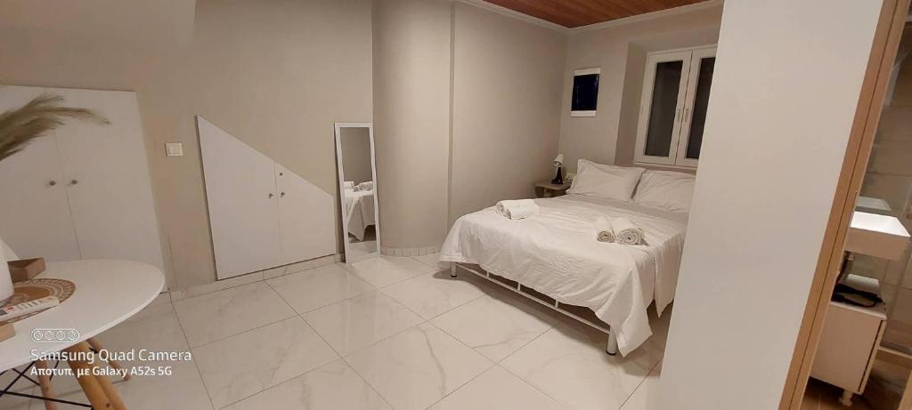 Double bedroom with wardrobe, mirror and dining table